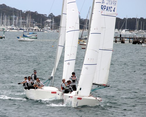 Sam Mckenzie, right, leads Liam Bennett in the pre start in the consolation round robin - 20th Harken International Youth Match Racing Championships © Damian Devine